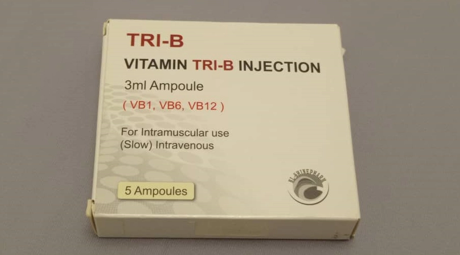 a box of vitamin tri - b injections on a blue background