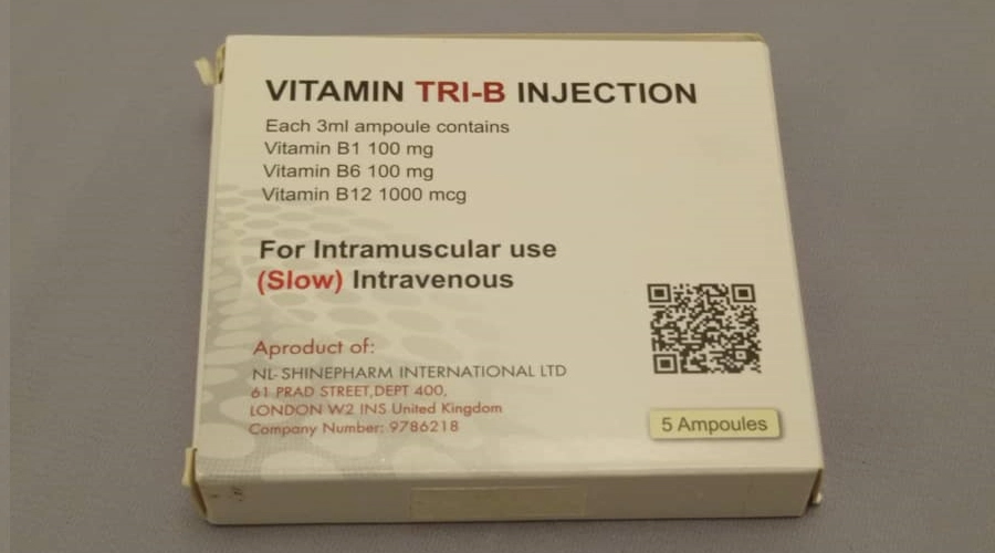 a box of vitamin tri - b injections on a blue background