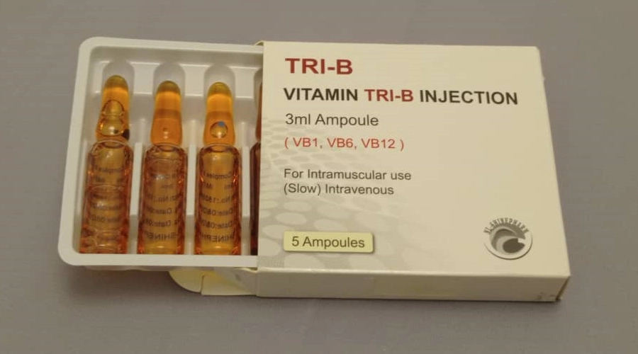 a box of vitamin tri - b injections on a blue background